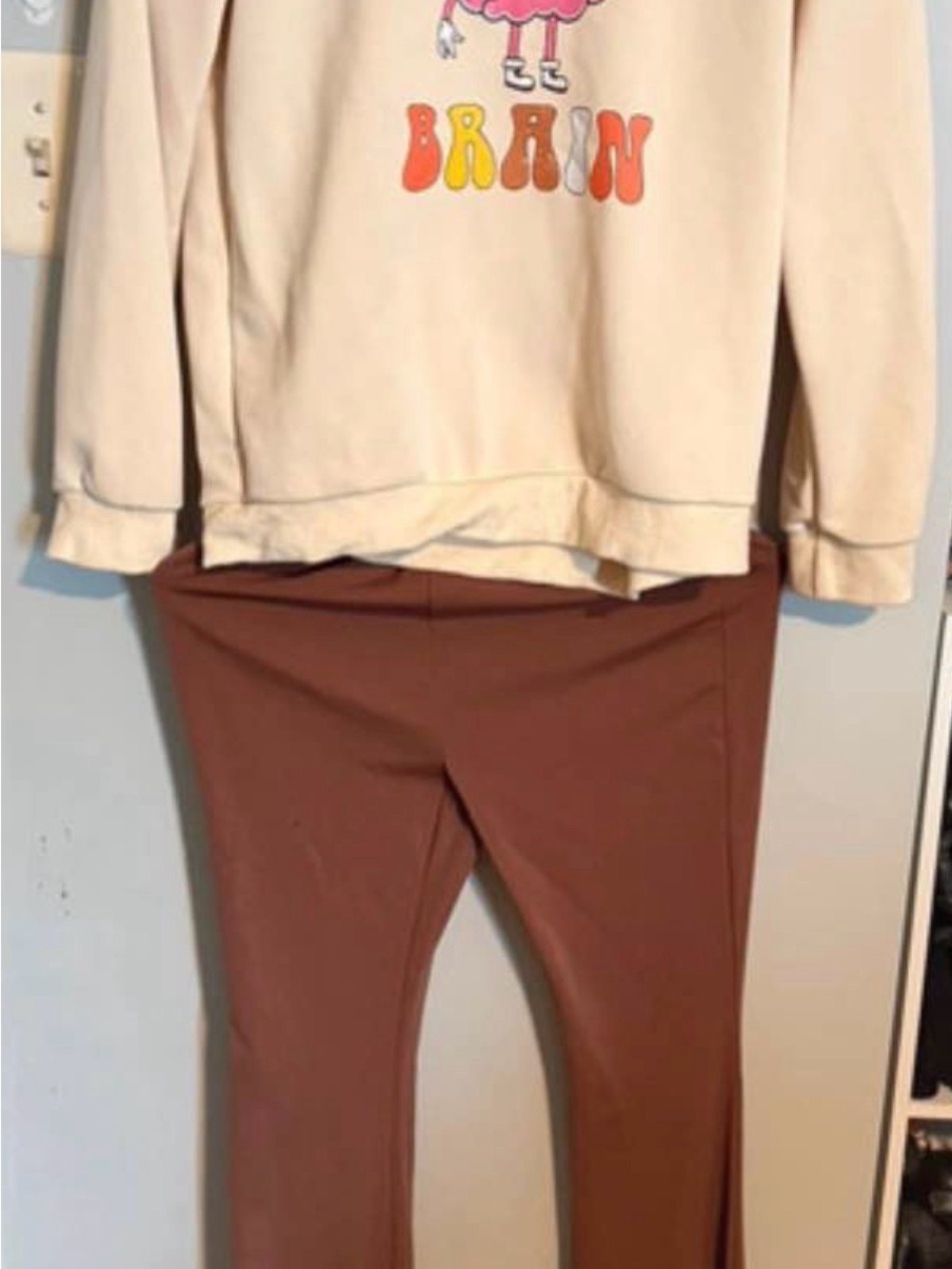 SHEIN Cream Graphic Top with Brown Flare Leggings